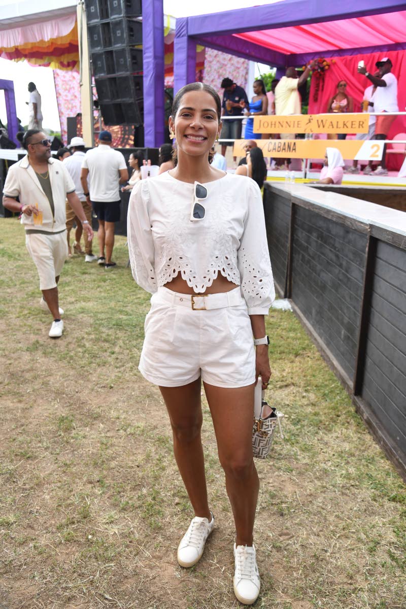 Communications Consultant Lyndsey McDonnough, co-managing director of MarketMe, eases into a white embroidered top and crisp linen shorts, complete with low tops for a laid-back ensemble.