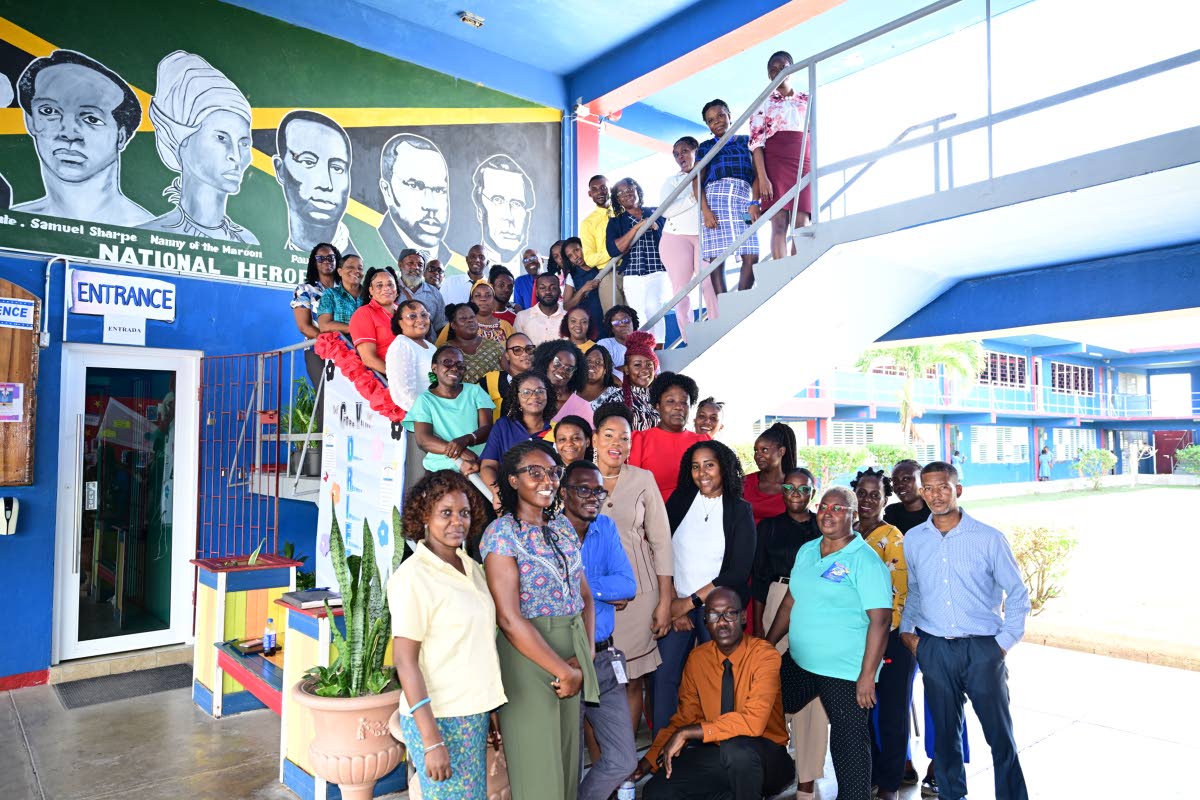Staff at the Clarendon-based Kemps Hill High School take time out for a photo opportunity.