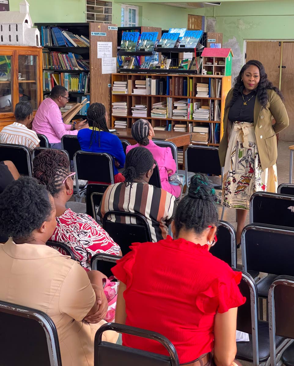 Natassia Wright, co-founder of Mind Food International, during a recent session with staff at Meadowbrook High School.