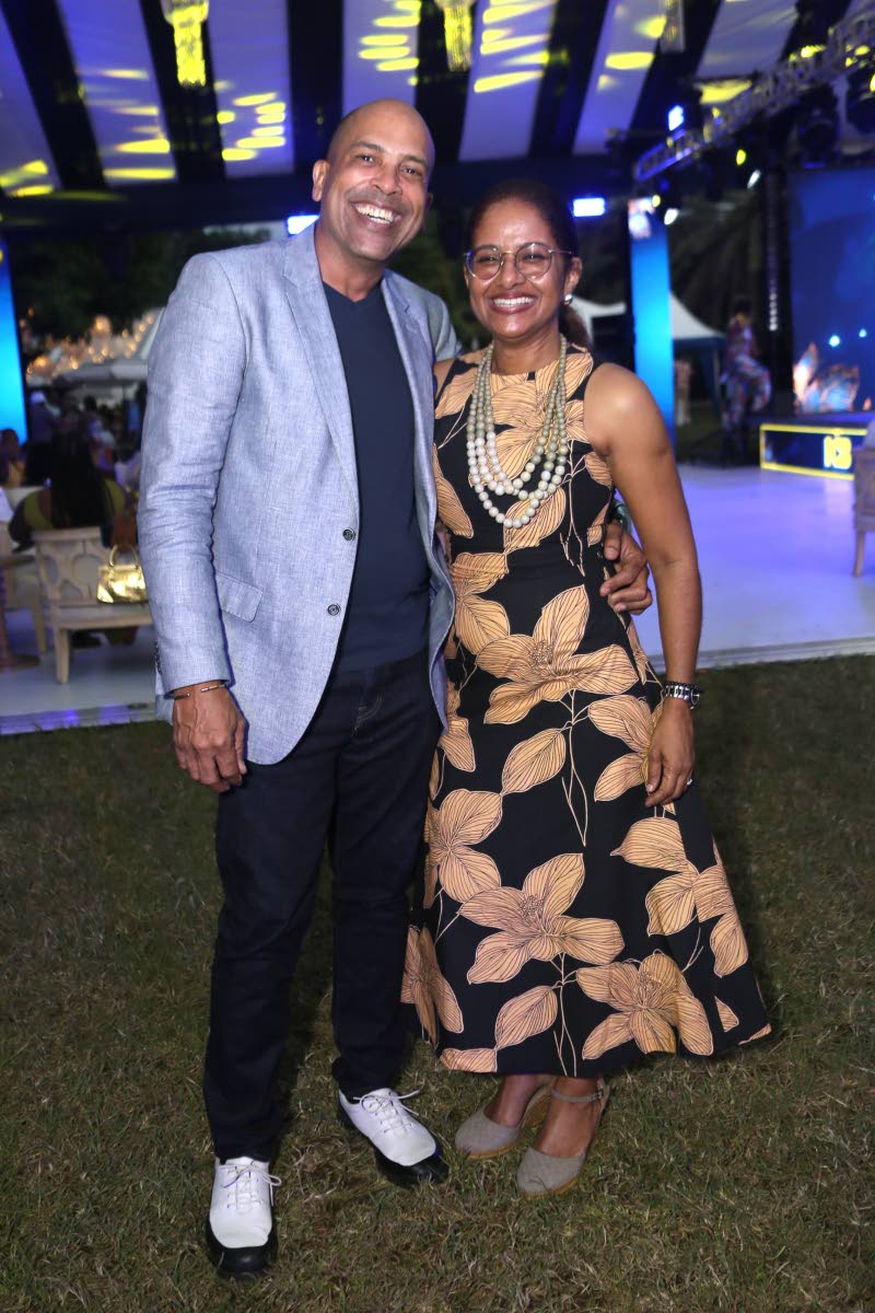 NCB Chief Operations Officer, Sheree Martin, is joined by her husband, Wayne Martin, at NCB Lumé held at Hope Botanical Gardens in St Andrew.