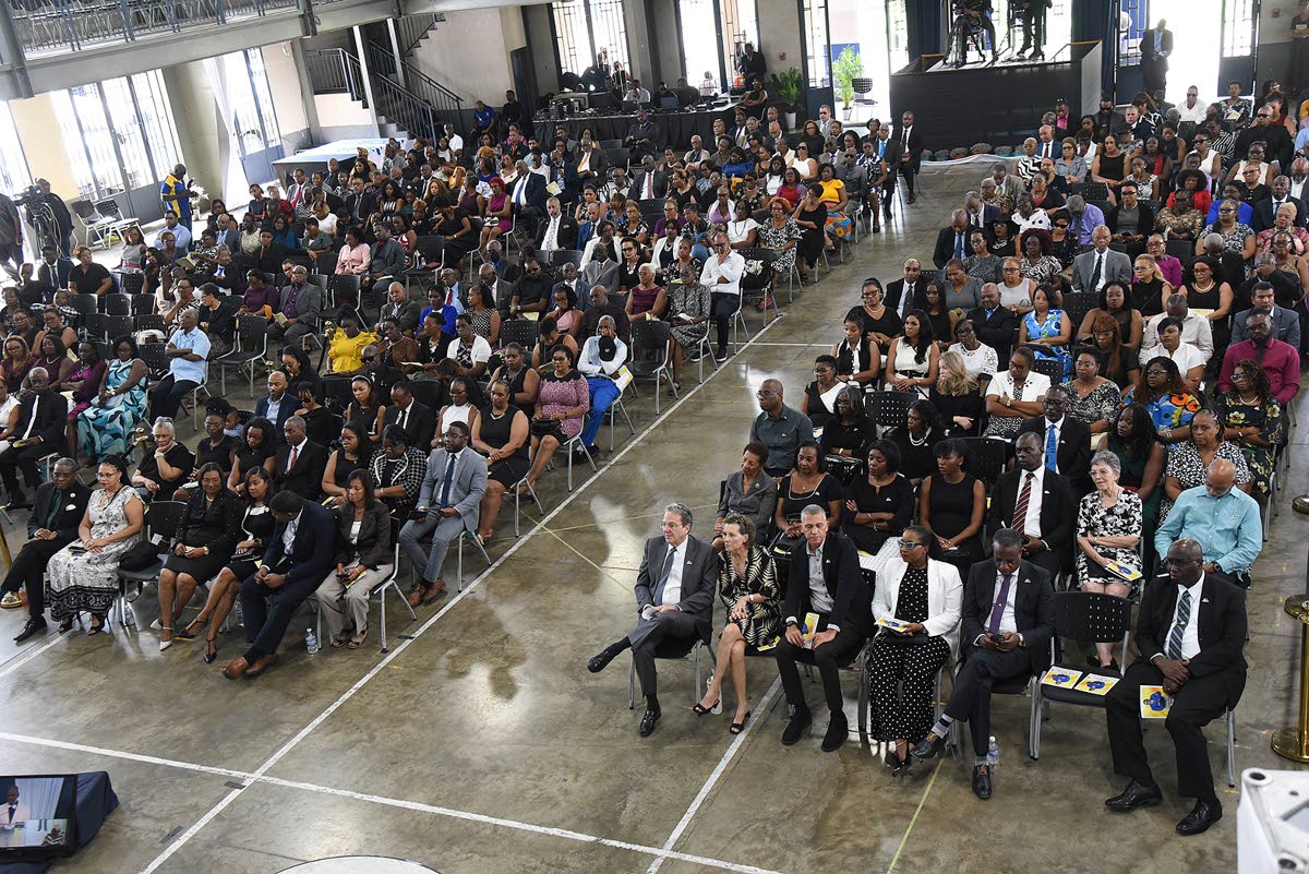 Mourners at yesterday’s thanksgiving service for the life of Anthony Smith, former CEO of the RJRGLEANER Communications Group, held inside the Karl Hendrickson Auditorium at Jamaica College in St Andrew. 