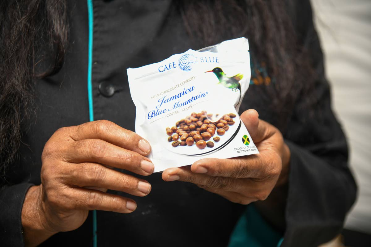 Chef Jackie Tyson with Café Blue’s chocolate-covered coffee beans.