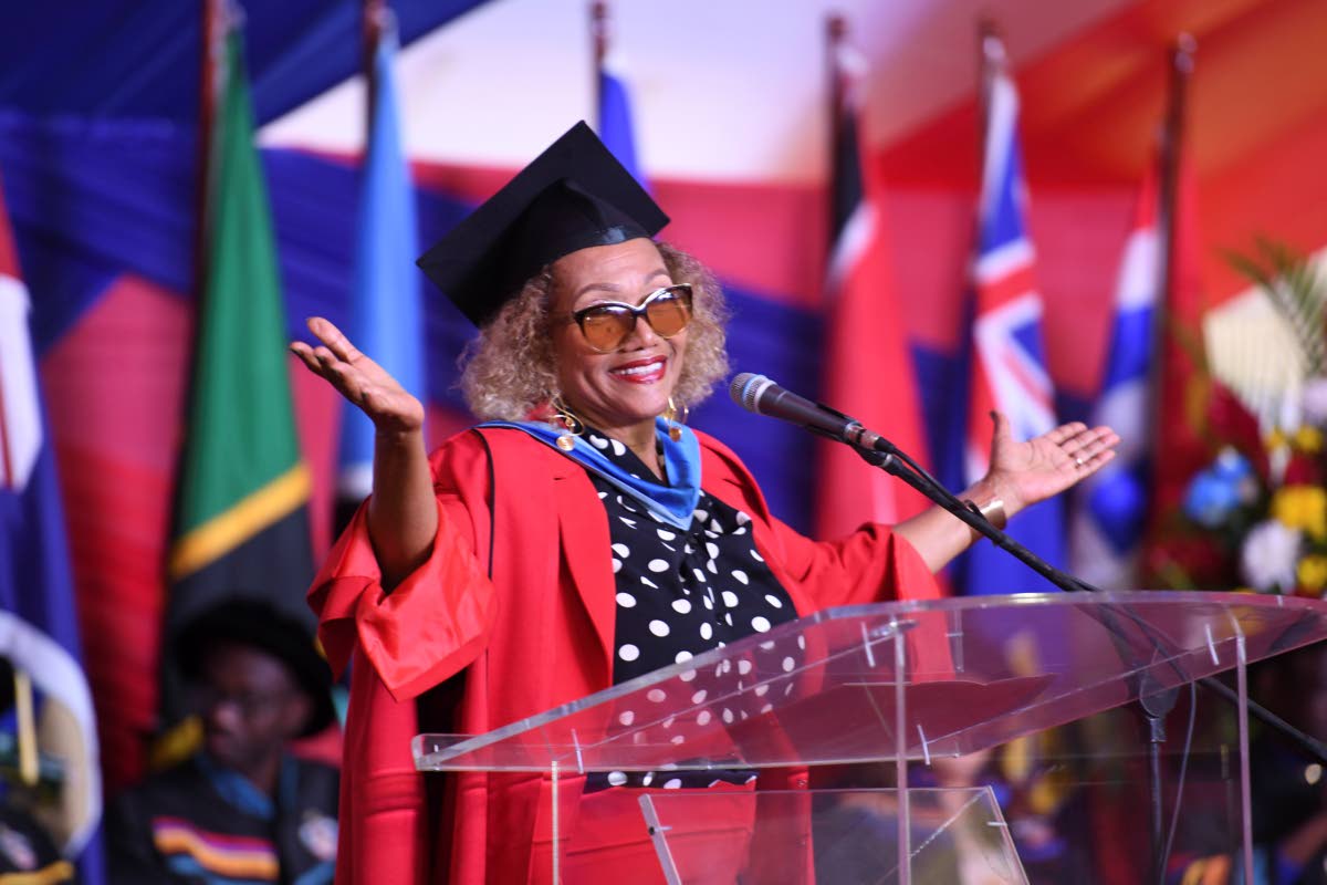 Reggae icon Dr the Honourable Marcia Griffiths addresses graduates after being conferred with an honorary Doctor of Letters during the University of the West Indies, Mona, graduation ceremony on Saturday, January 17.