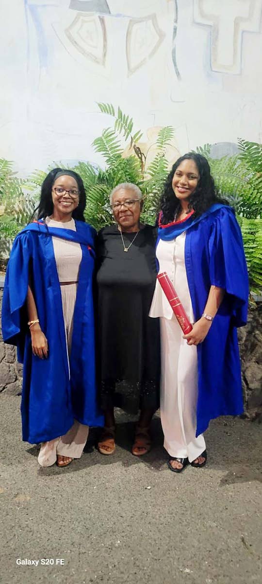 Joan Crooks (centre) celebrates with her granddaughters Ana‑Paige Henry (left) and Marianna Crooks (right), who both graduated from The University of the West Indies, Mona. 