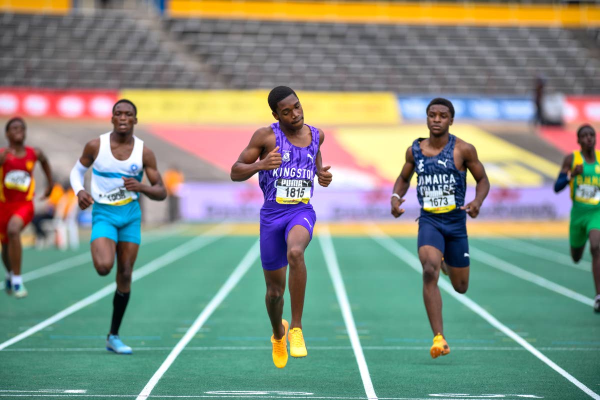 Lacovia High Schoo’s Nicholas Jones (left), competing in the Boys’ Class 3 200 metres at the ISSA/GraceKennedy Boys and Girls’ Athletics Championships inside the National Stadium last year. Ahead of him is Kingston College’s Andre Genus (centre) an