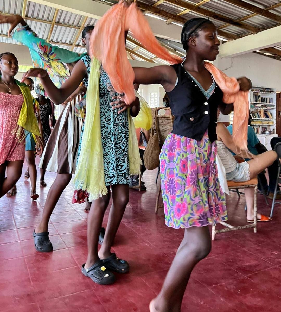 Participants in the Girls Becoming Mentoring Programme take part in a fashion parade.