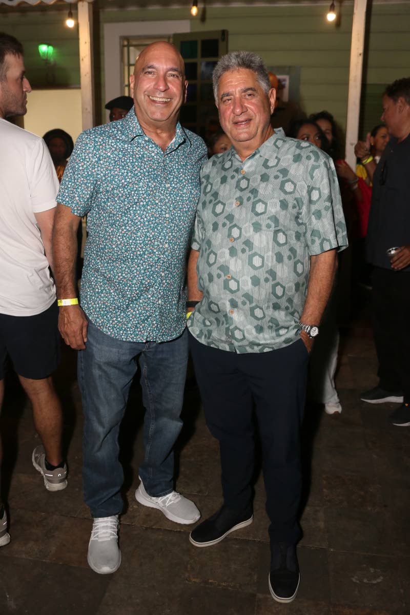 Unwinding on a Friday night is always a good idea, just ask Christopher Zacca, president and CEO of Sagicor Group, and businessman Gassan Azan Jr.