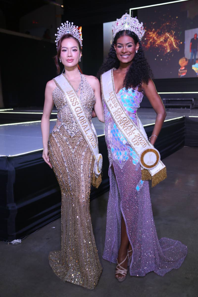 Miss Global 2025 Nguyen Dinh Nhu Van (left) supports Jamaica’s Keri-Ann Greenwood, first runner-up at Miss Global, as she handed over her crown at the local coronation on Saturday.