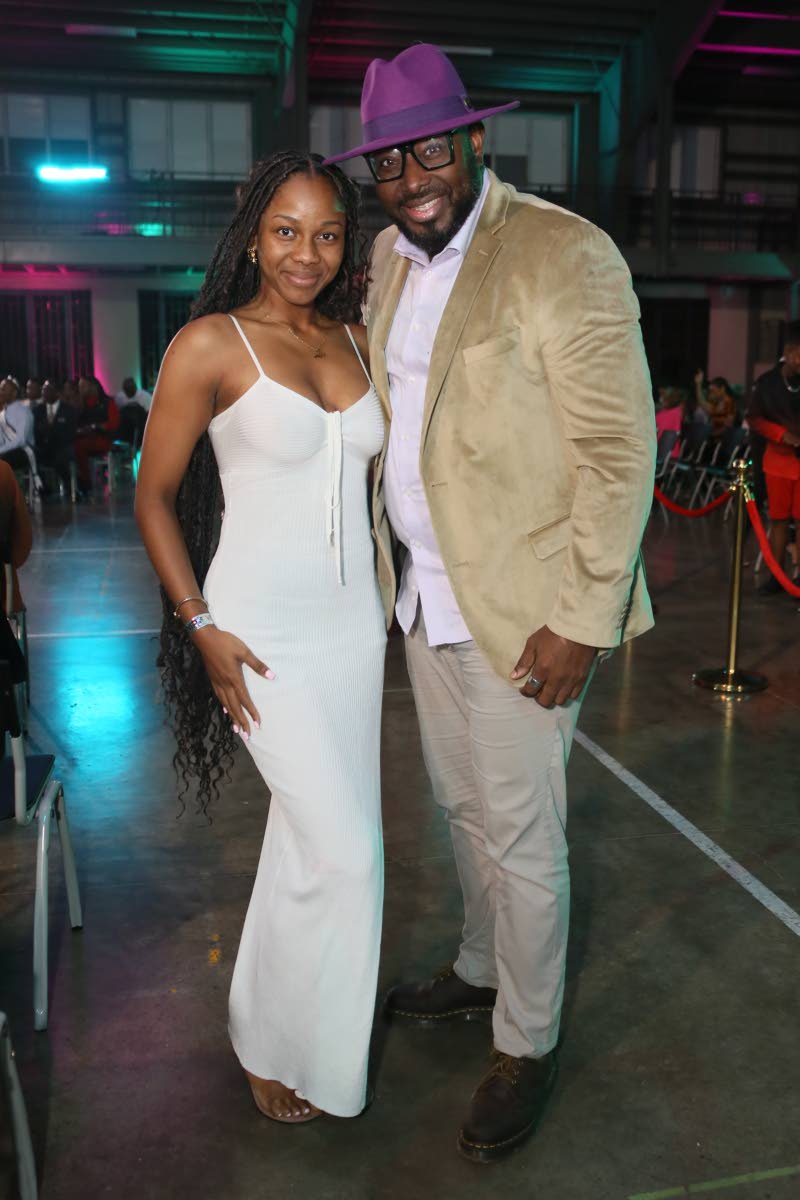 It’s a family affair for Ewan Simpson, chairman at the Jamaica Reggae Industry Association, and his daughter Klavier, as they soak up the night’s proceedings.