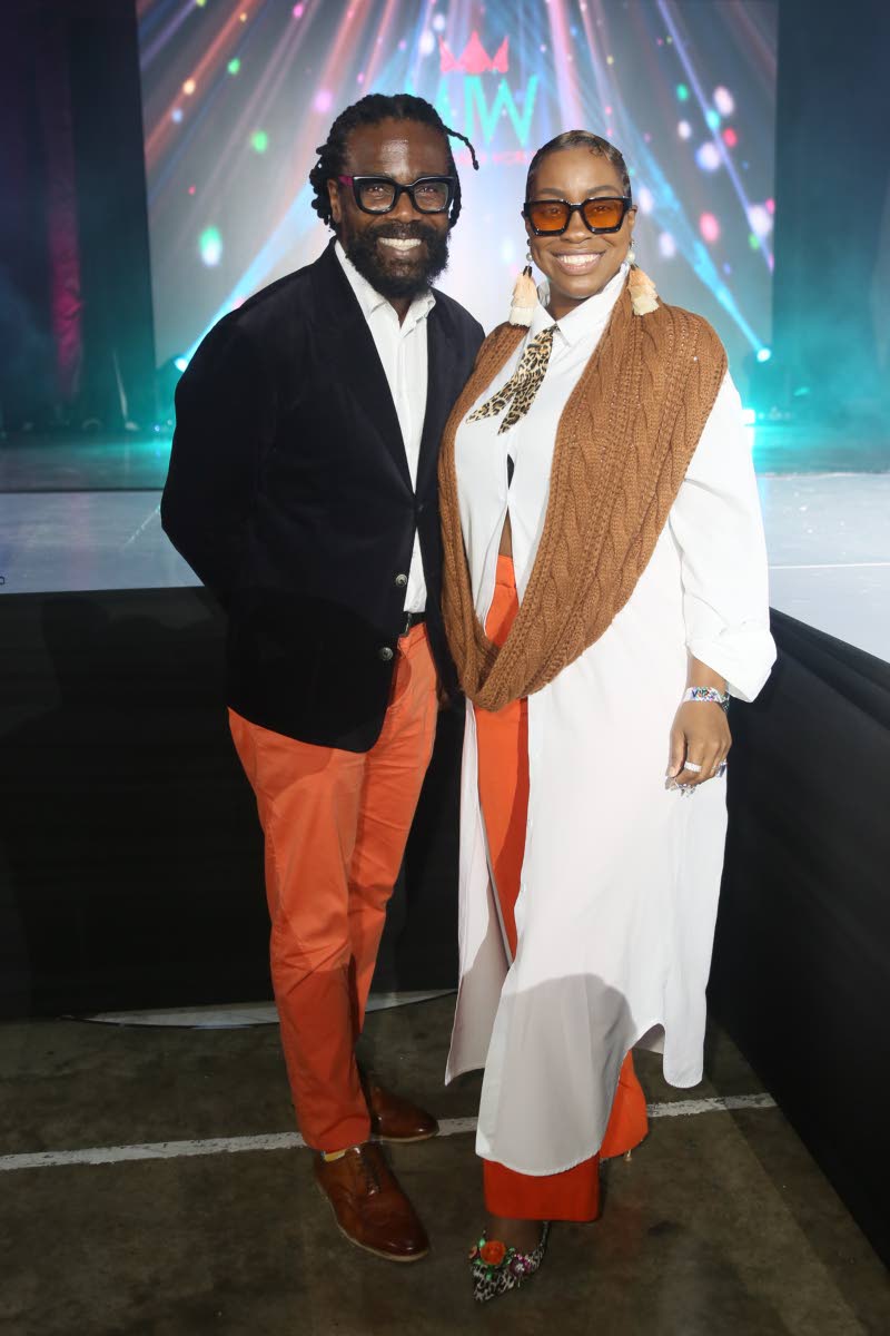 It is smiles all around from Ryan Bailey of Tiamo Beach Resort and Anna Smith, president of the Eternal Father Awards.