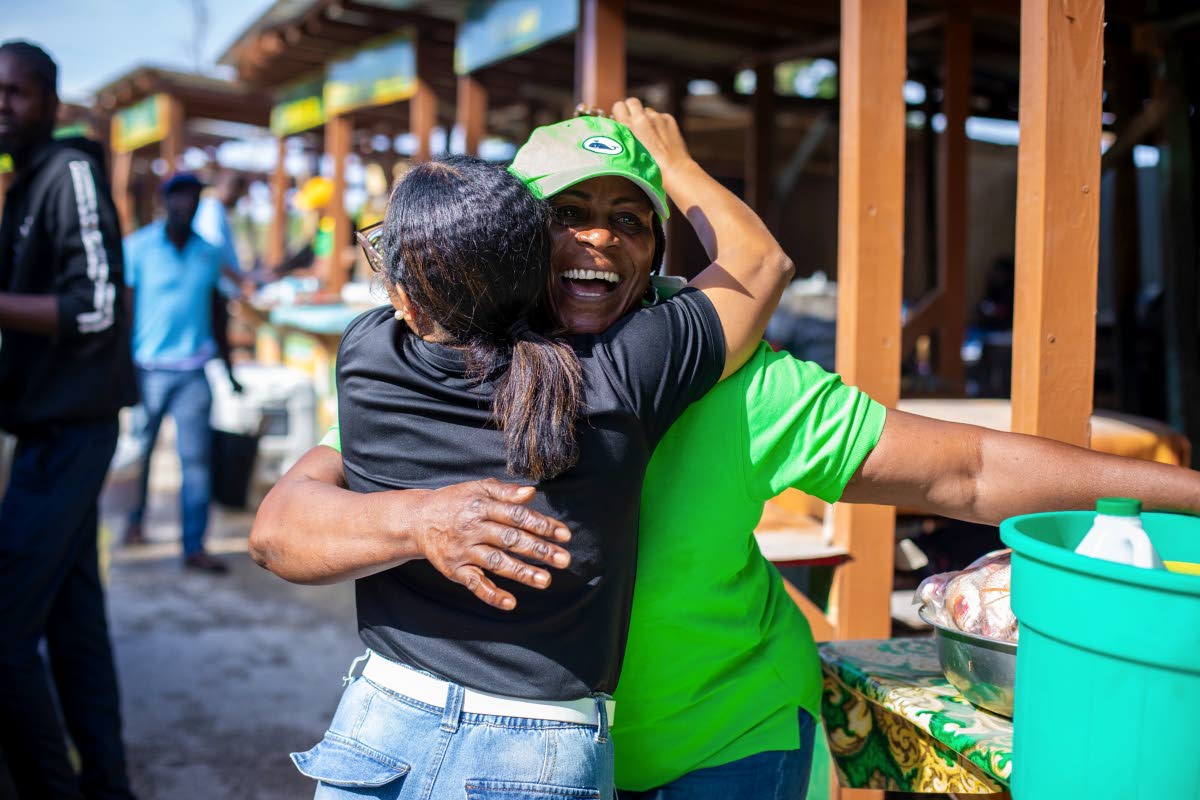 The excitement and good vibes that filled the air at the official Border Food Village reopening ceremony on January 16, is perfectly captured in this heartfelt hug from senior vendor Monica Baker, to a member of the Sean Paul Foundation team.