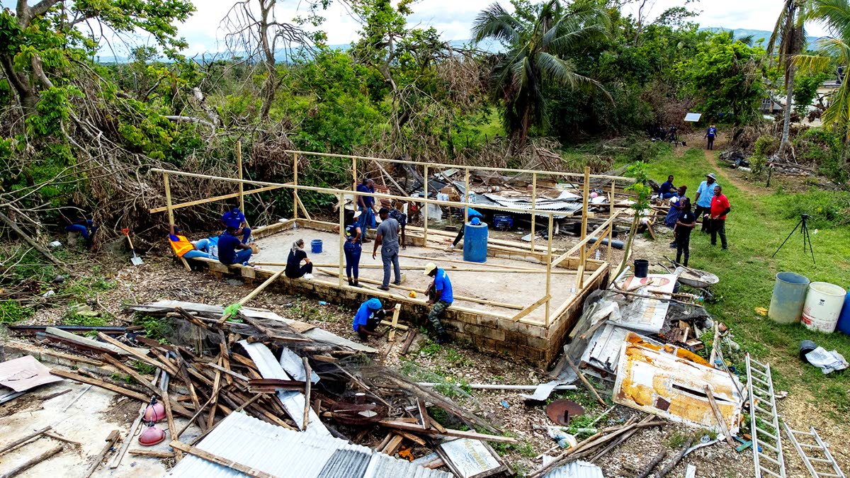 An overhead view highlights the extensive damage left by Hurricane Melissa at a chicken farm in St Elizabeth, where the Nutramix team stepped in to support rebuilding efforts.