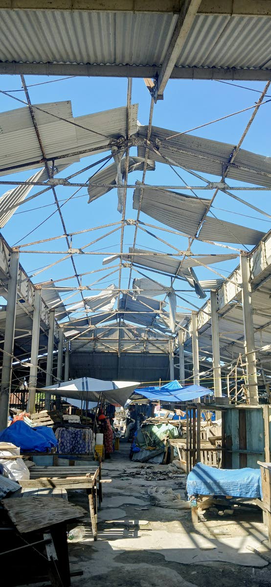 Damage to the roof of the Savanna‑la‑Mar Market after Hurricane Melissa last October.