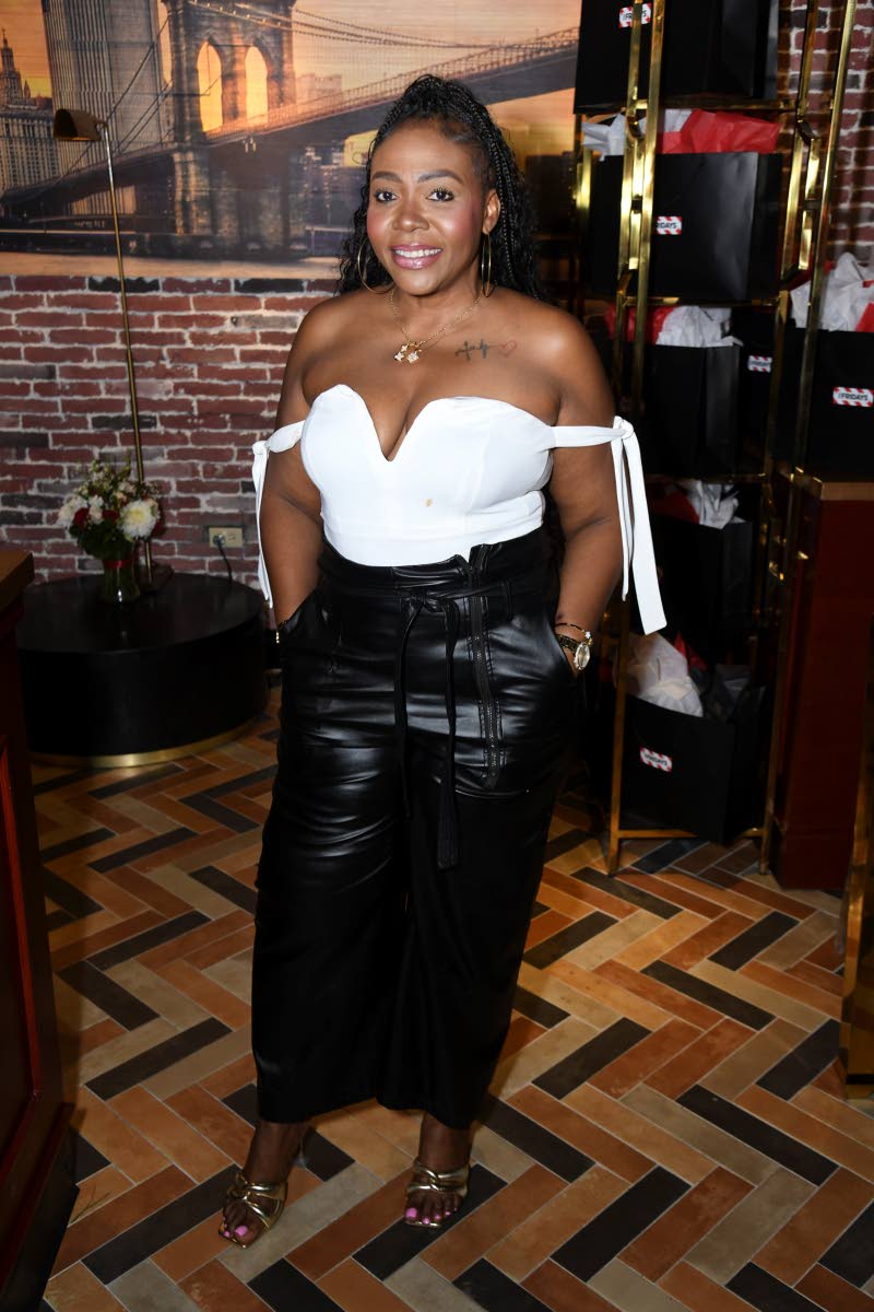 Suzette Hayletts, financial controller at Appliance Traders, opts for an off-the-shoulder plunging top, paired with subtle gold accessories.