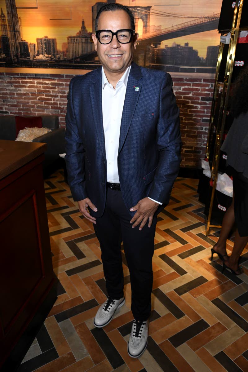 We spotted Juan Baez, chief executive officer of Caribbean Producers (Jamaica) Limited, having a good time.