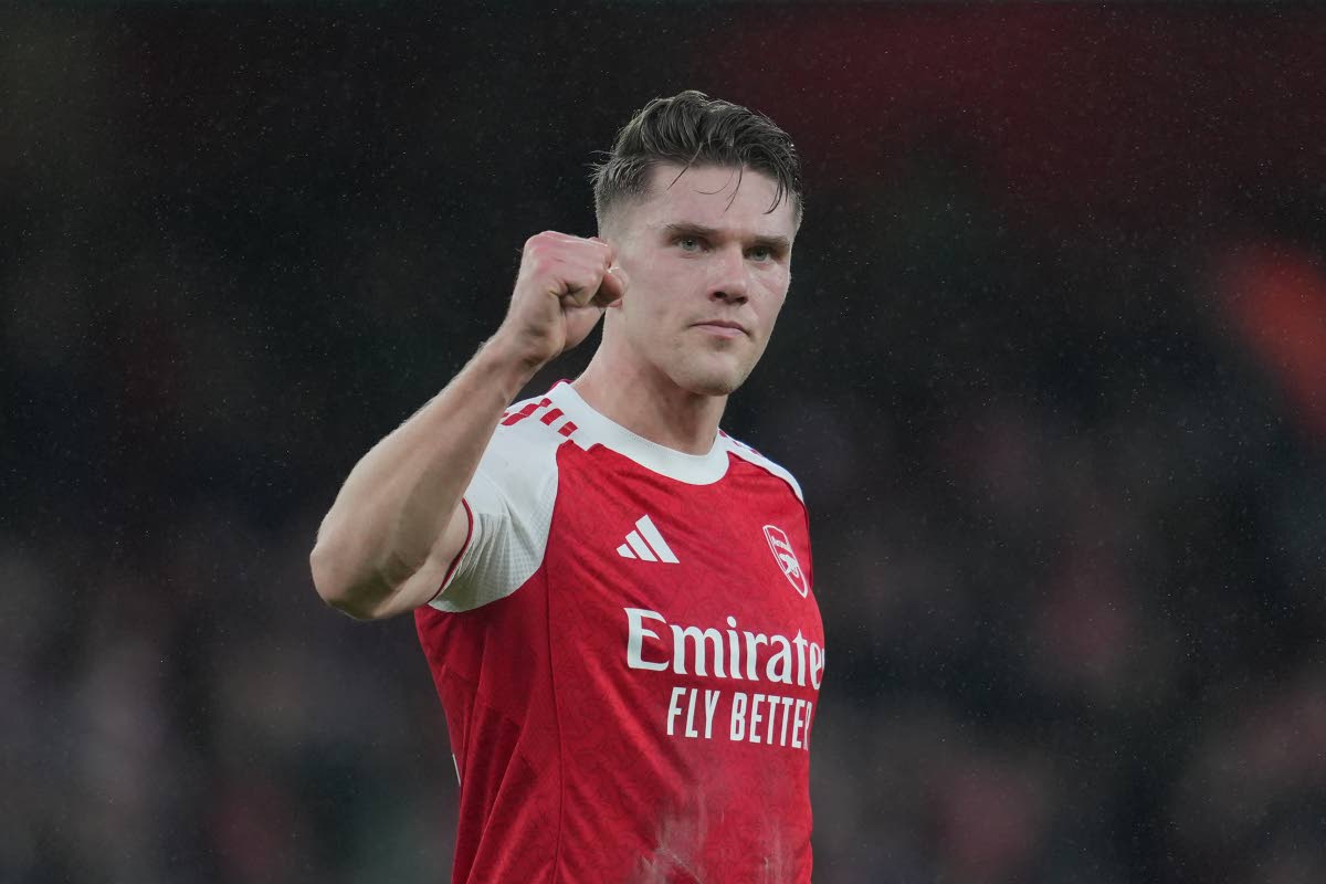 left: Arsenal’s Viktor Gyoekeres reacts after scoring during the English Premier League football match against Sunderland in London, England, yesterday.