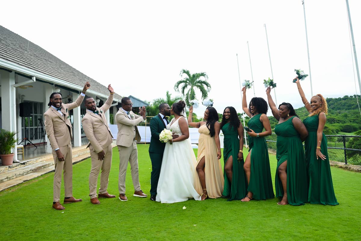 Hyping up the newly-weds on their big day were the Robothams wedding party!