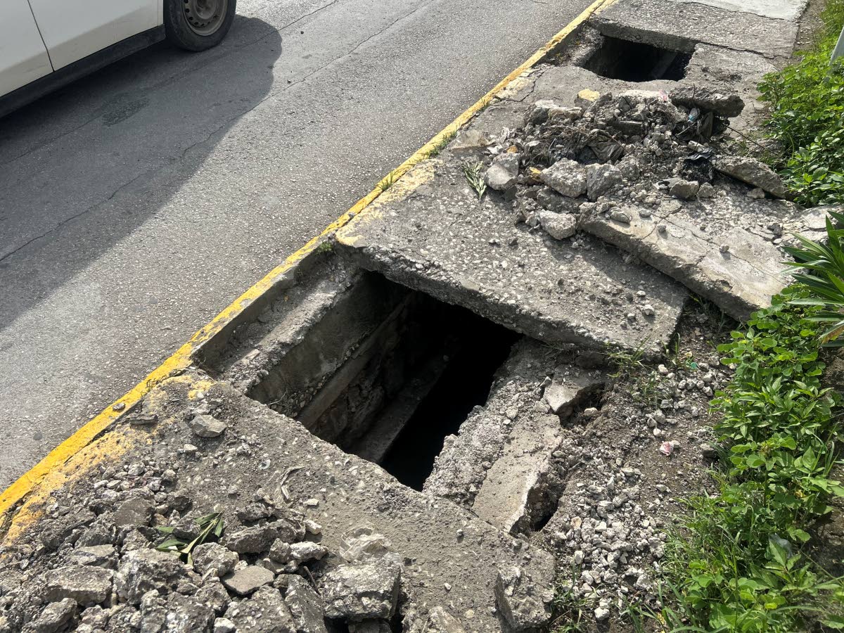 A section of the broken sidewalk along Barracks Road in Savanna-la-Mar, Westmoreland.