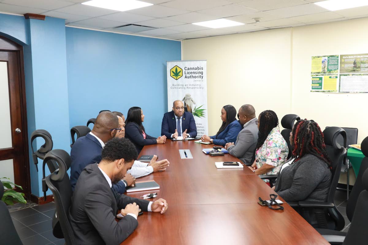 Delano Seiveright, minister of state in the Ministry of Industry, Investment and Commerce,, meets with the full executive management team of the Cannabis Licensing Authority during a recent boardroom briefing and working visit to the Authority’s offices.