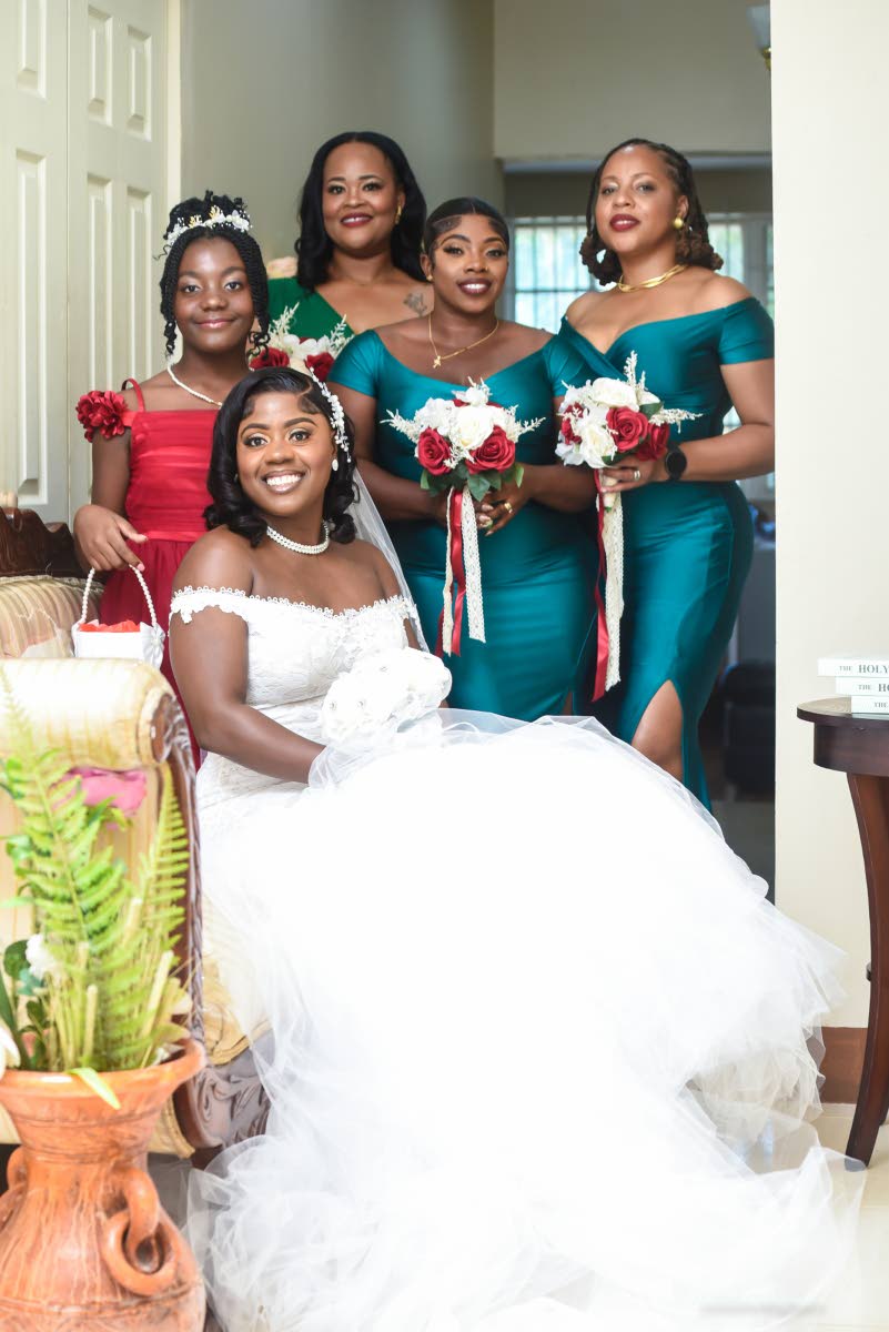 Sitting pretty in anticipation of her wedding day, the beautiful bride (front) is joined by (from left) her daughter and flower girl, Gabrielle Wilks; matron of honour Lesley Ann Ricketts; and bridesmaids Tashanna Powell and Rochelle Johnson.