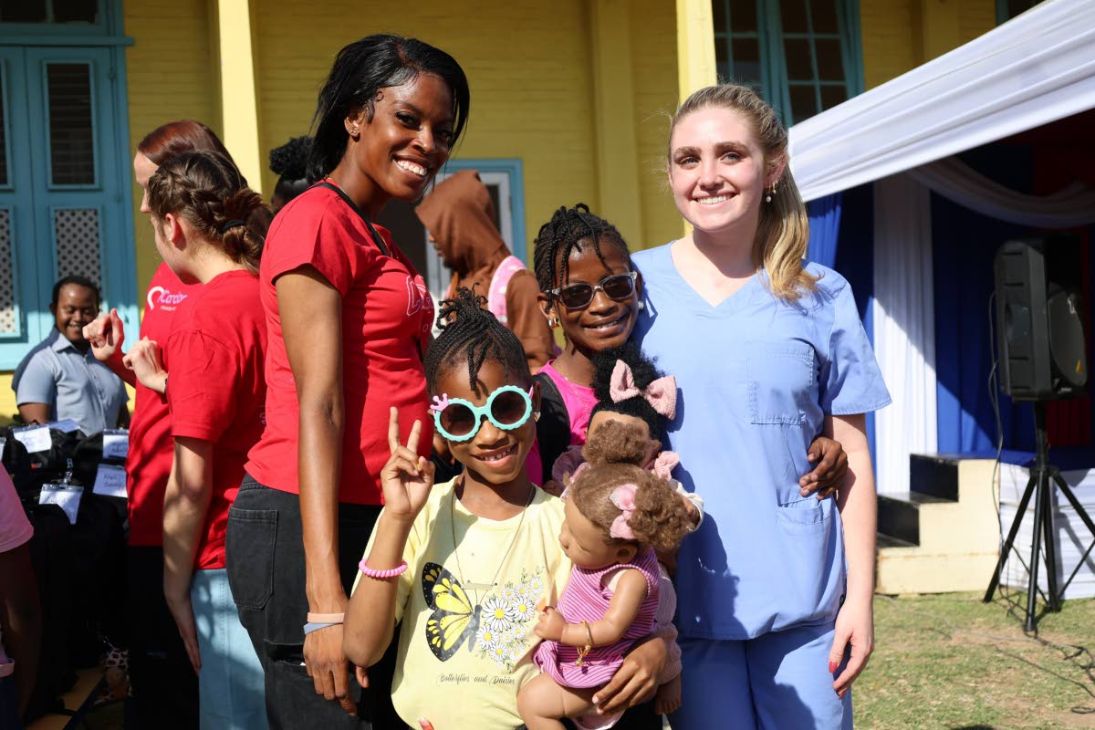 Sashanique Johnson (second right) received her life-changing surgery from Cardiac Kids Foundation of Florida in 2017. Here, she shares a happy moment with her mother Drewcella Francis (left), sister Silayina Reid and Jessica Jacobs (right) from Cardiac Kid