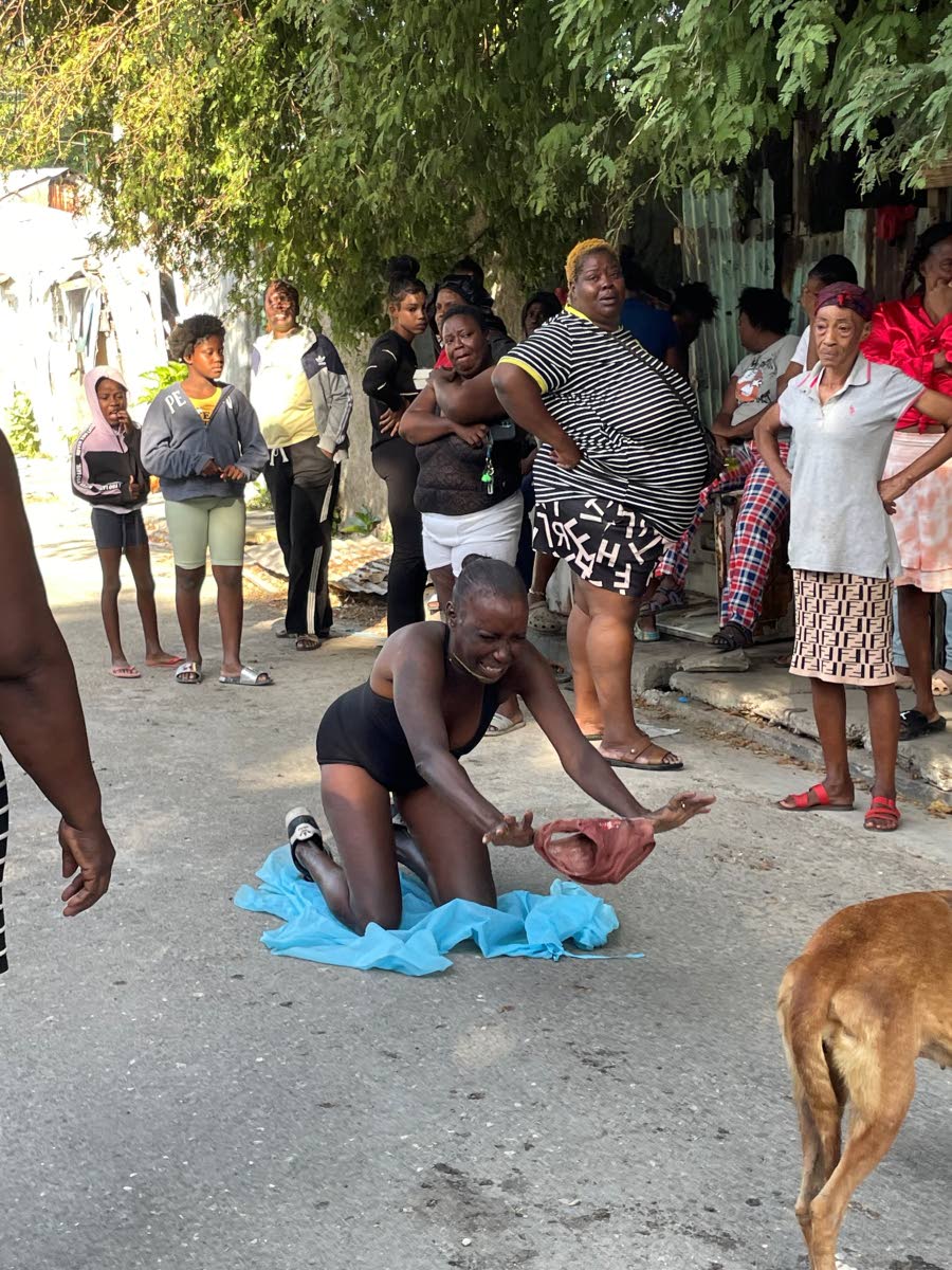 Ladonia Cunningham, mother of three-year-old Jace Pinnock, shows the bloodied white brief he was wearing when he was shot.