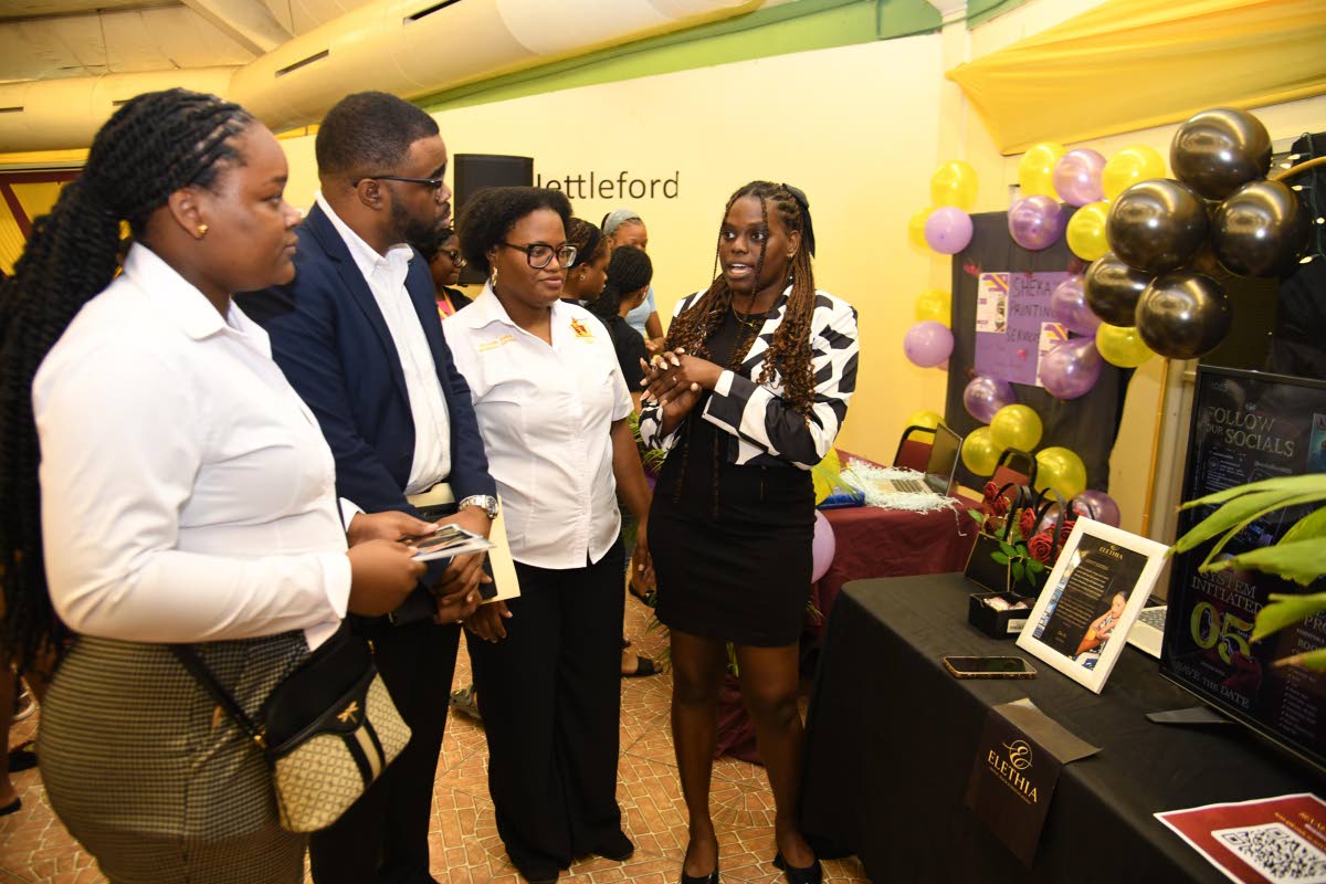 From left: Rochelle Daley, resident advisor at Rex Nettleford Hall; Michael Mullings, keynote speaker and CEO of Chatflow; Sandrene McKenzie, CEO of San’script; and Khalia King, owner of Elethia Creative, in dialogue at Rex Nettleford Hall’s business e