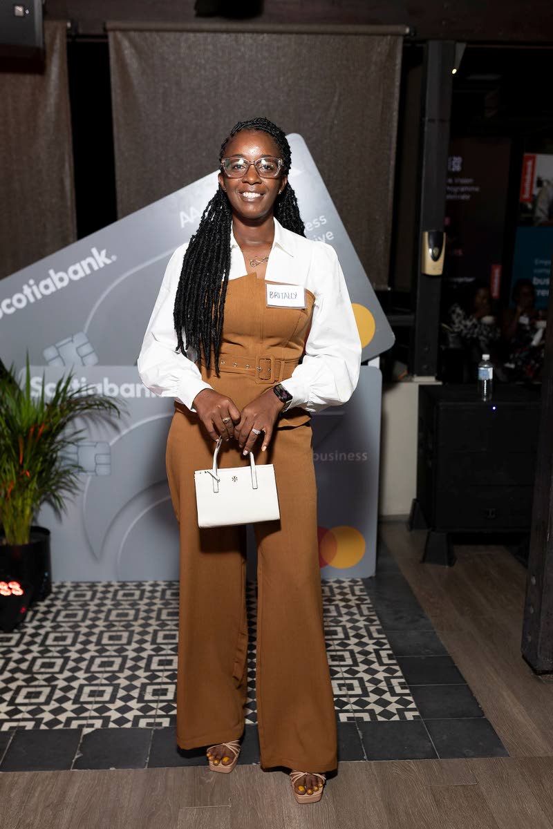 Britally Ricketts, owner of Golden Peak Ltd, stuns in neutrals.