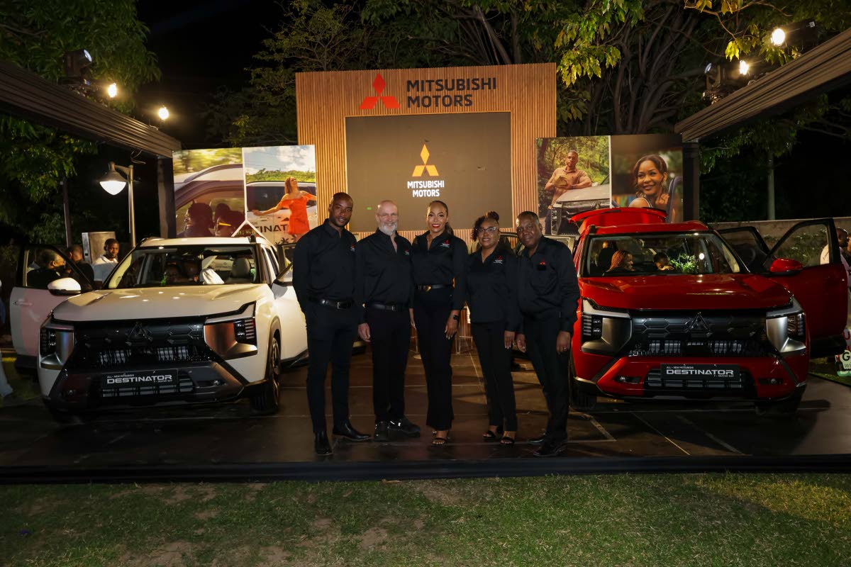 The all-new Mitsubishi Destinator takes centre stage as key stakeholders gather for its launch at the Jamaica Pegasus Hotel. Marking the official unveiling are (L-R) Franz Lawrence, Brand Sales Manager, Mitsubishi Motors Jamaica, Duncan Stewart, Managing D