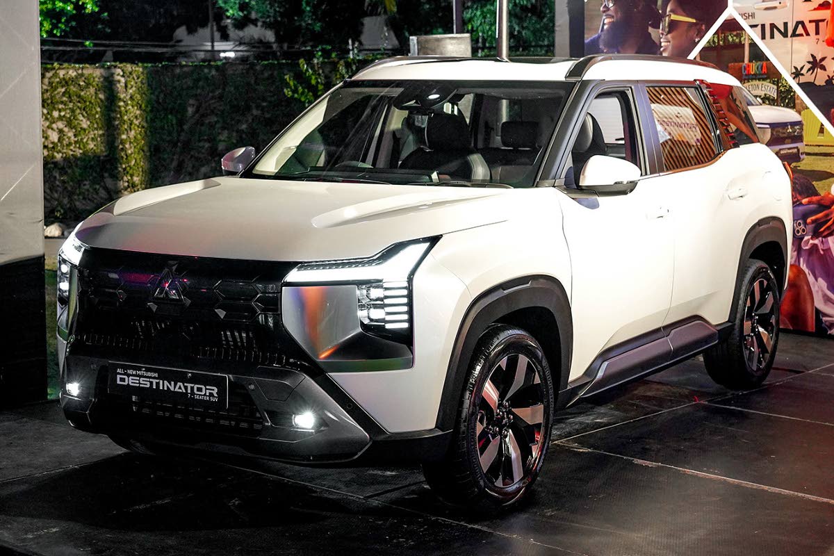 The Mitsubishi Destinator presents a bold and contemporary outward look, defined by its wide stance and sharp character lines. At the front, the Dynamic Shield grille integrates seamlessly with T-shaped LED headlamps, giving it a commanding and futuristic 