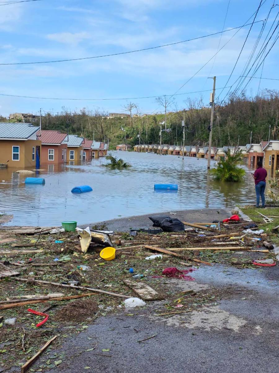 Several homes in Phase 2 of The Estuary remaining under water a day after the passage of the Category 5 Hurricane Melissa last October.