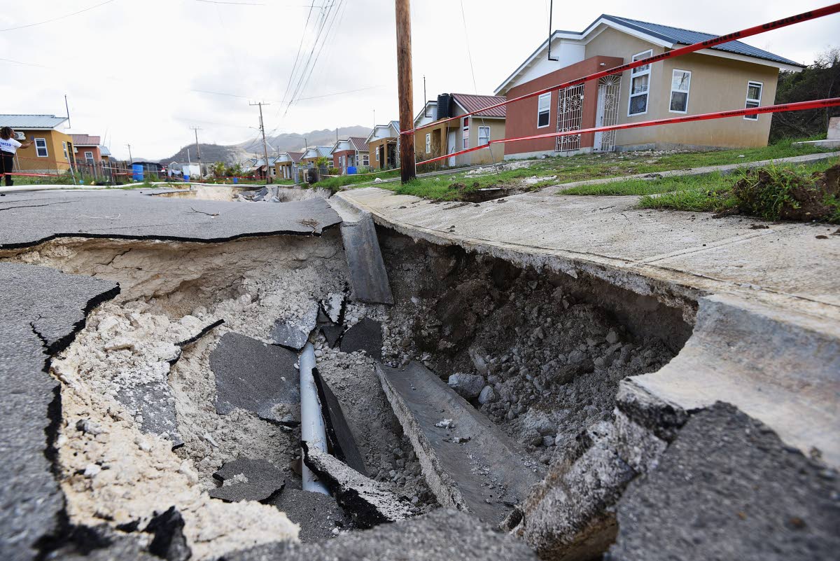 The collapsed roadway in Phase 2 of The Estuary as seen on November 6, 2025. Homeowner Ian White believes the collapse had a role to play in the flooding as it disrupted the channel taking the water away from the area.