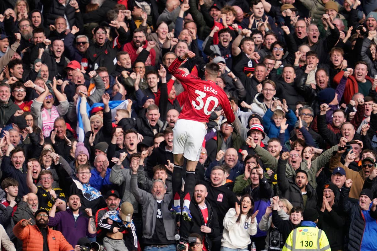 Manchester United's Benjamin Sesko scelebrates after scoring during the Premiier League football match between Manchester United and Crystal Palace in Manchester, England on March 1, 2026. (AP Photo/Dave Thompson)