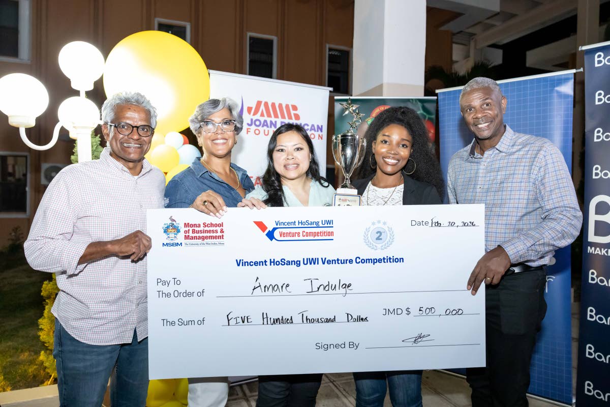 From left: Douglas Lindo, director of JMMB Joan Duncan Foundation; Kim Mair, CEO JMMB Joan Duncan Foundation; Simone Hanson, representing Amaré Indulge; and Wayne Sutherland, director of the JMMB Group, pose for a photo. Amaré Indulge was awarded second 