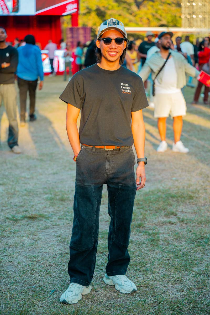 Founder of the Sweat and Salty run club Justin Lowe keeps it classic in black denim and a bold graphic cap.