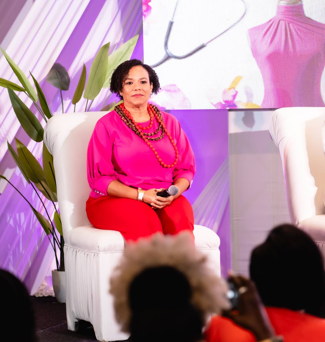 Robertson-Sylvester on stage at Plie’s Women of Vision Salon.