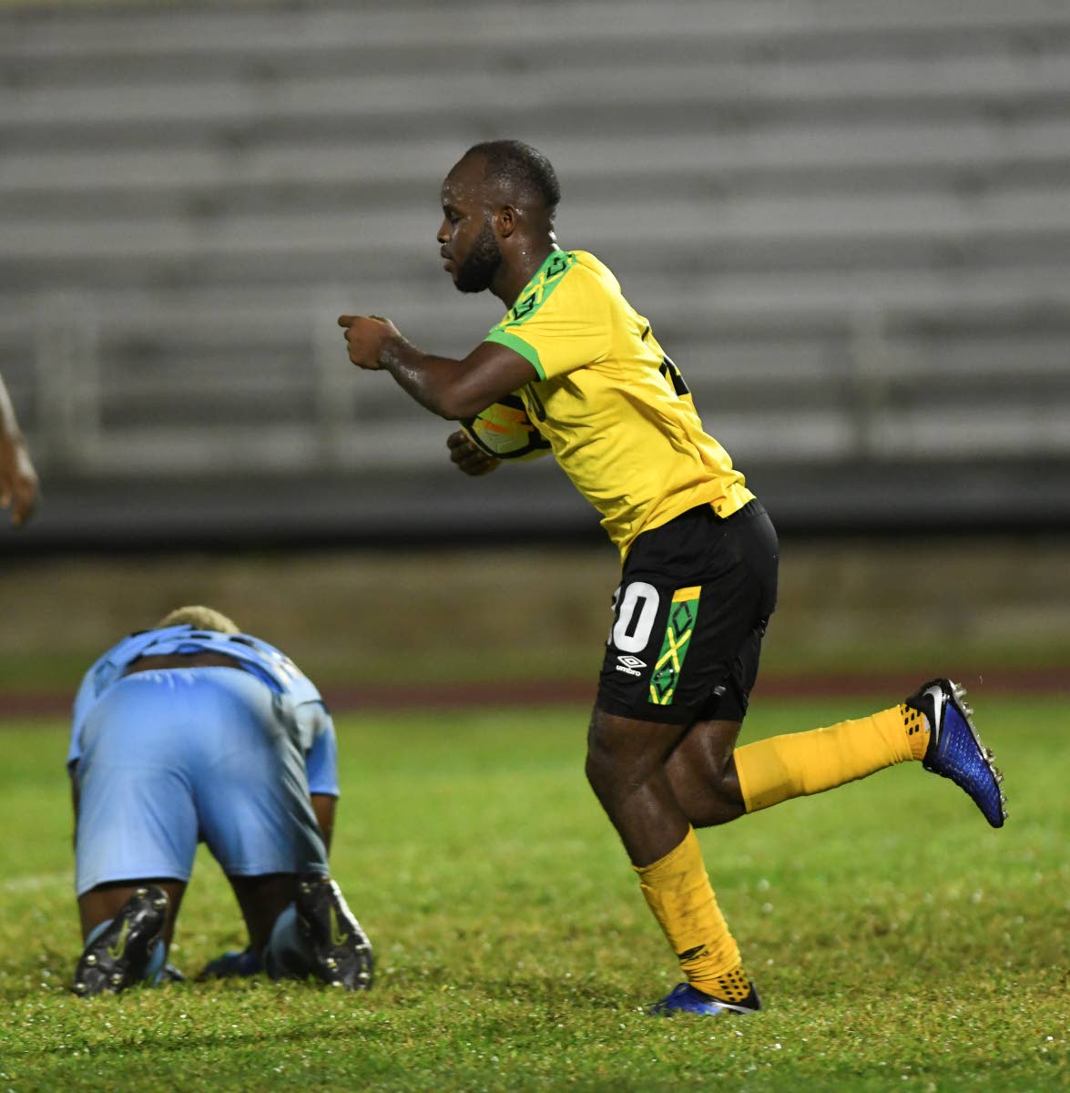 Javon East celebrates scoring a goal for Jamaica in a Concacaf Nations League football match against Guyana at the Montego Bay Sports Complex.