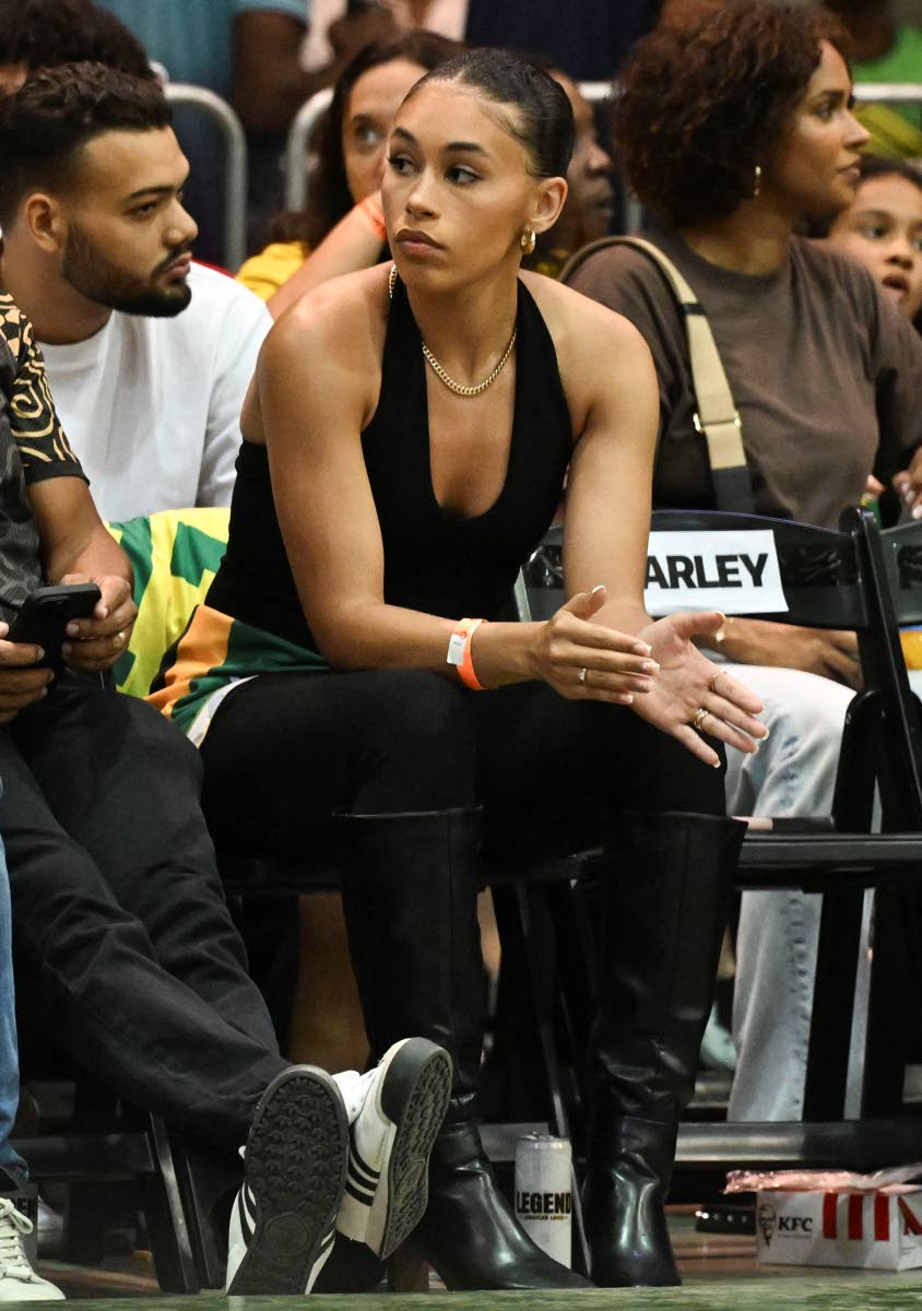 The girlfriend of Jamaica’s Chase Audige, Alia Moore, shows support for the basketballer during a FIBA World Cup basketball qualifier against Canada inside the National Indoor Sports Centre on Sunday.