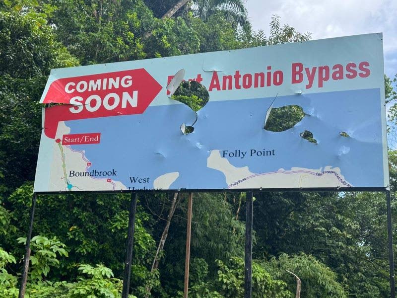 Vandalised Port Antonio Bypass sign. 