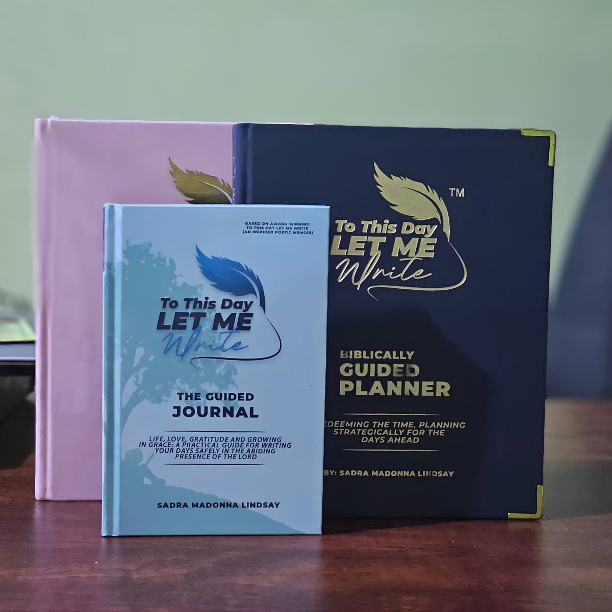 The ‘To This Day Let Me Write’ series includes a guided planner and guided journal designed to help individuals plan intentionally, reflect deeply, and execute purposefully.