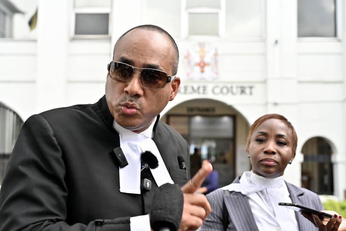 Defence attorneys Peter Champagnie, King’s Counsel, and Patrice Riley address members of the media after the sentencing hearing. 