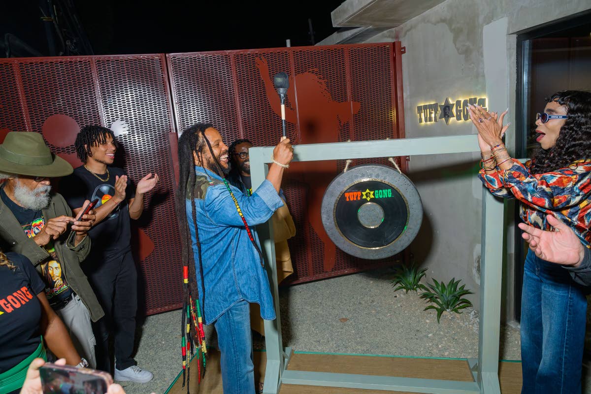 Contributed Photos
Guests look on as Stephen Marley (left) strikes a gong, signalling the official reopening of Tuff Gong Studio in Kingston on Thursday, to the delight of his sister, Cedella Marley.
