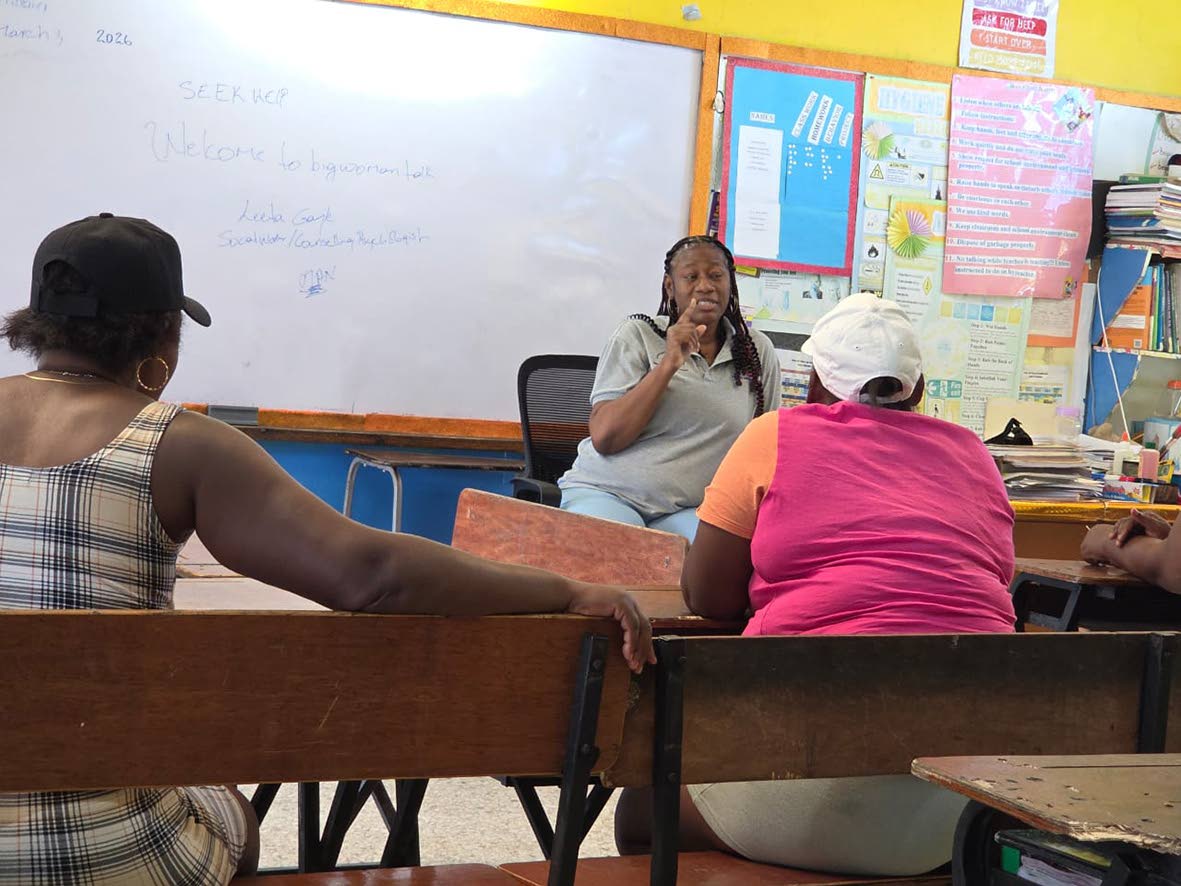 Letta Gayle, social worker at the Violence Prevention Alliance delivers a counselling session at Chalky Hill in St Ann.