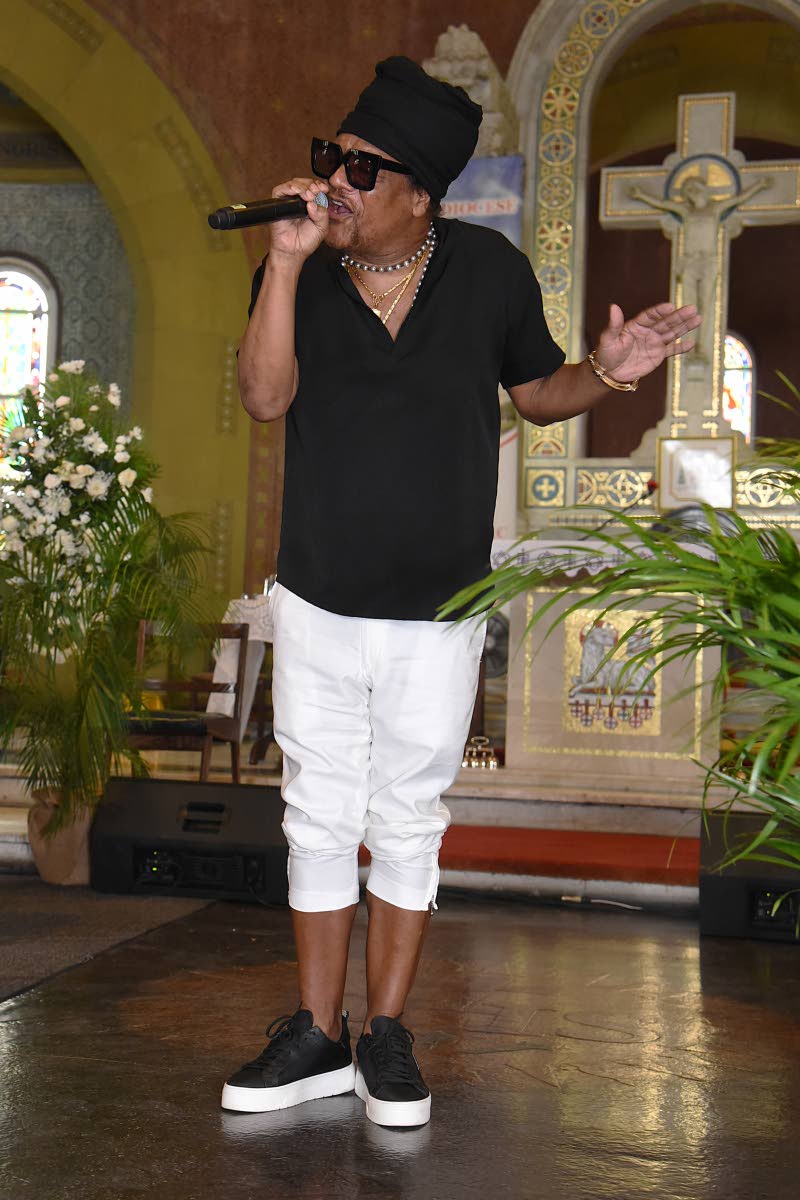 Maxi Priest performs at the Thanksgiving Service for Lowell ‘Sly’ Fillmore Dunbar at Holy Trinity Cathedral in Kingston on Saturday. 