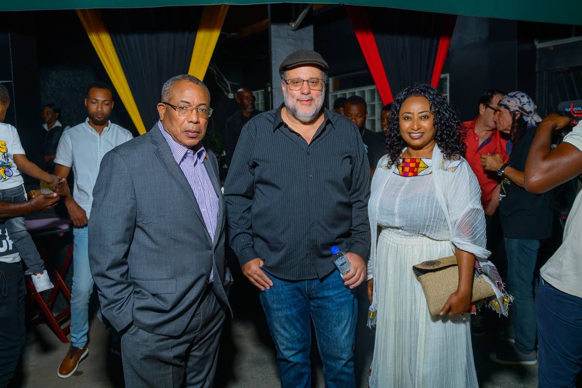 Opposition Leader Mark Golding (centre), is flanked by Anthony Hylton, member of parliament for West St Andrew, and Honorary Consul for Ethiopia in Jamaica, Yodit Hylton.