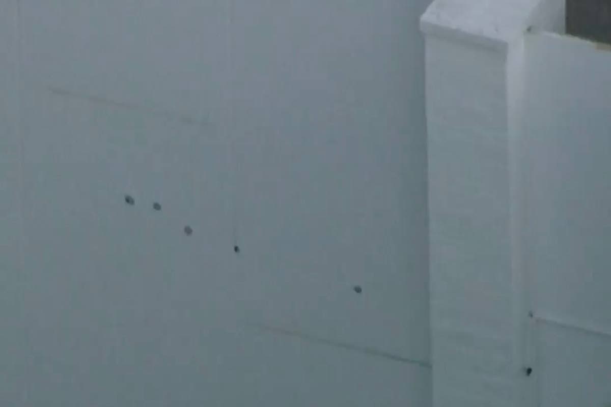 This image taken from video provided by ABC7 Los Angeles on Monday shows  what appears to be bullet holes on a wall at singer Rihanna’s home in Los Angeles.