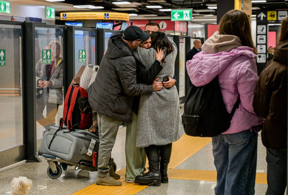 The flight from Abu Dhabi with passengers returned to Italy arrives at Fiumicino Airport, in Rome, on Tuesday, March 3. 