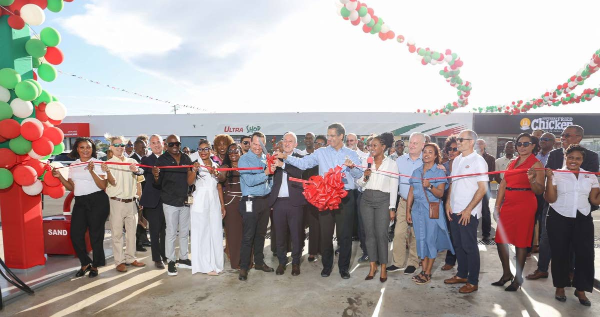 RUBiS leadership and guests at the ribbon‑cutting event for the company’s 50th flagship station on the Portmore Causeway. 
