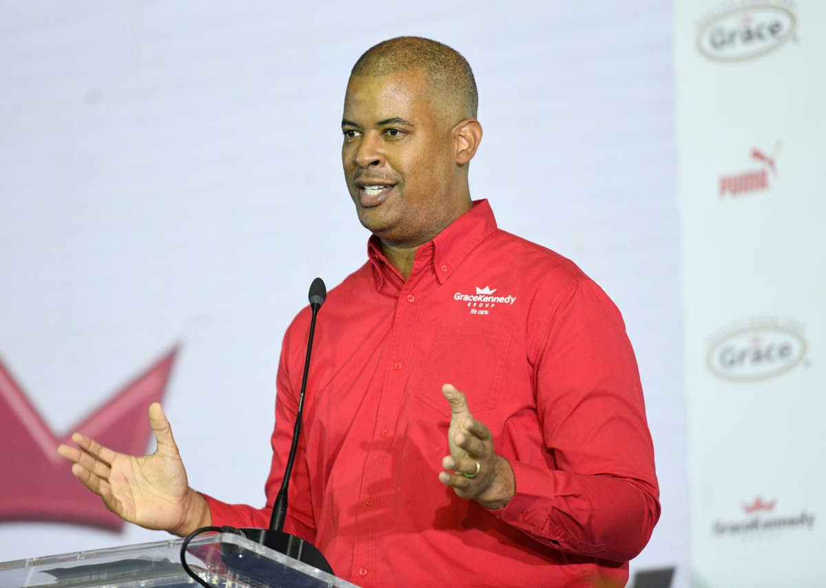 GraceKennedy CEO Frank James speaks during the lSSA/GraceKennedy Boys and Girls’ Athletics Championships launch at the National Arena yesterday.