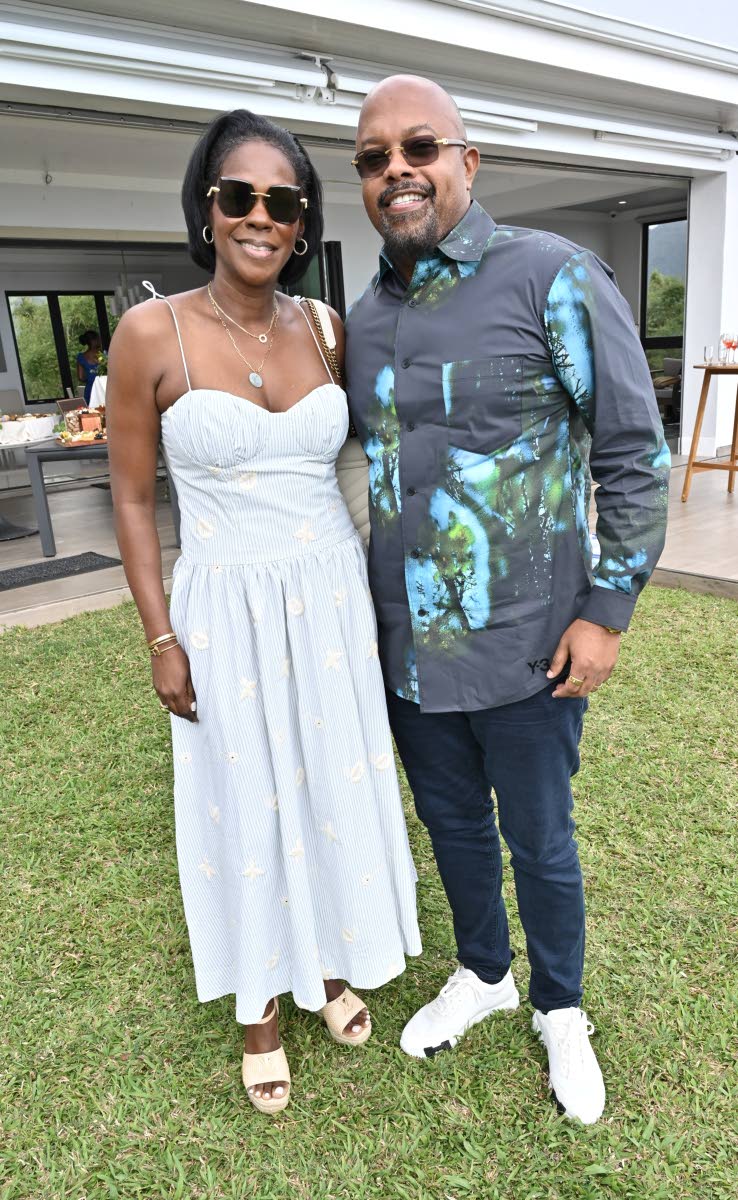 Karl Tulloch, Kemtek director and chairman of Kismet Group, happily poses with his other half, Billie-Jean.
